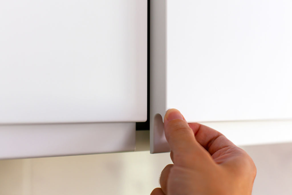 Check cupboard mechanisms and ensure doors align.