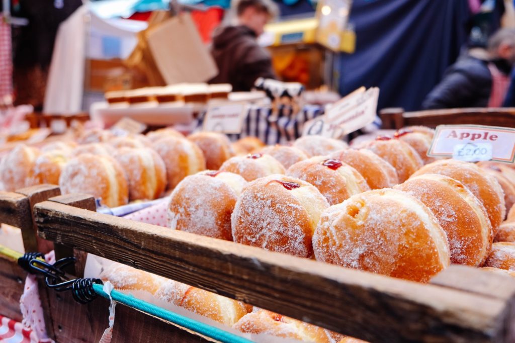 Donuts in a bakery; how to start a bakery business