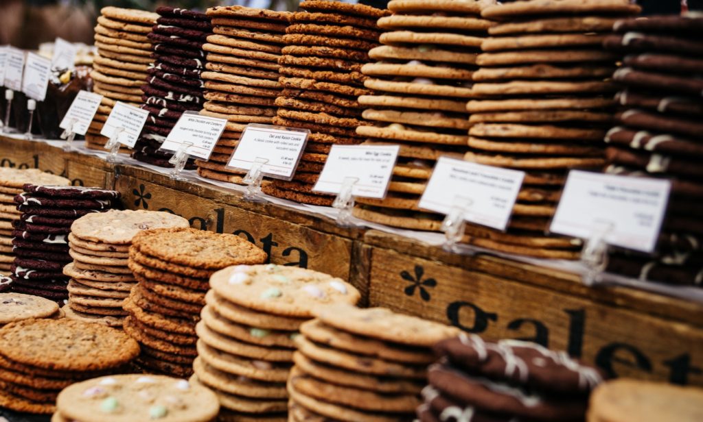 Cookies on display at a bakery; how to start a bakery