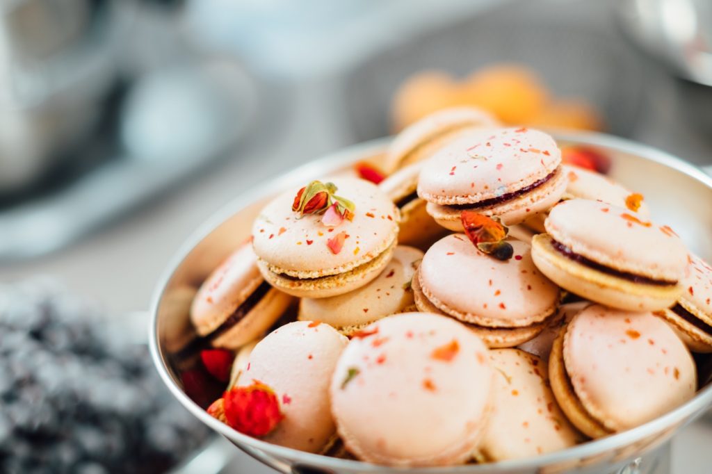 French macarons in a bowl; how to start a bakery business